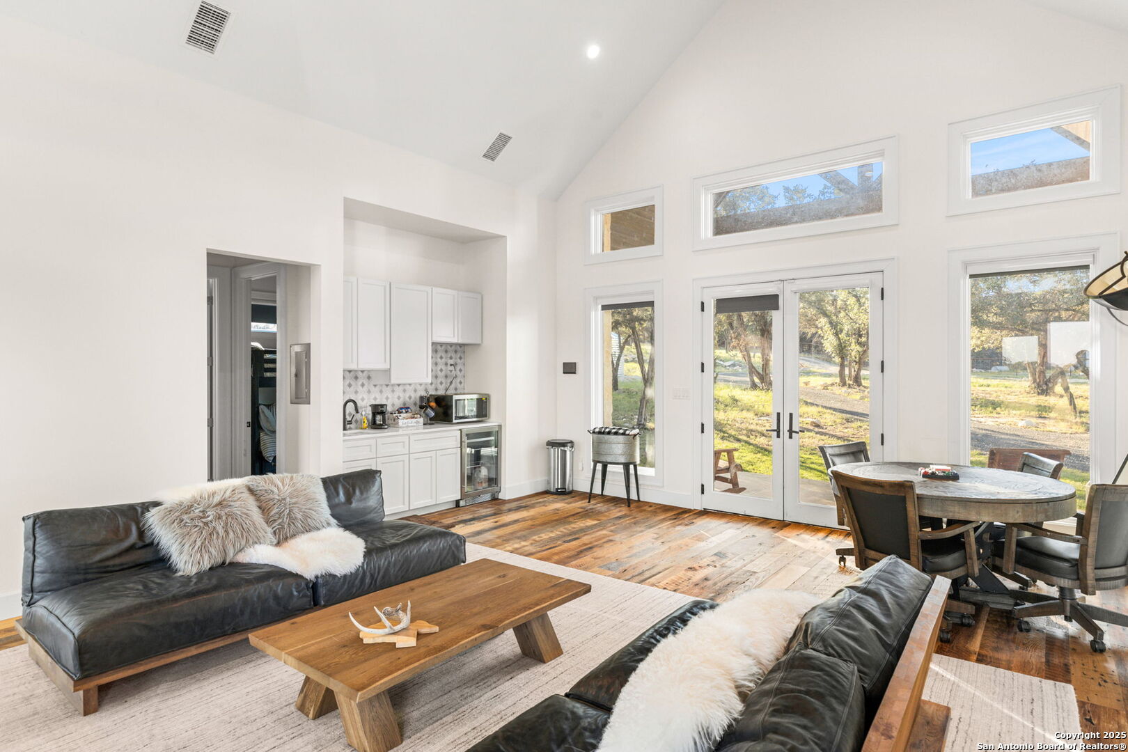 1146 Sisterdale Road Boerne, TX 78006 - Photo 34 of 94 a living room with furniture and a table