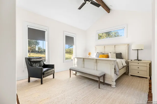 a view of a yard with snow on the road