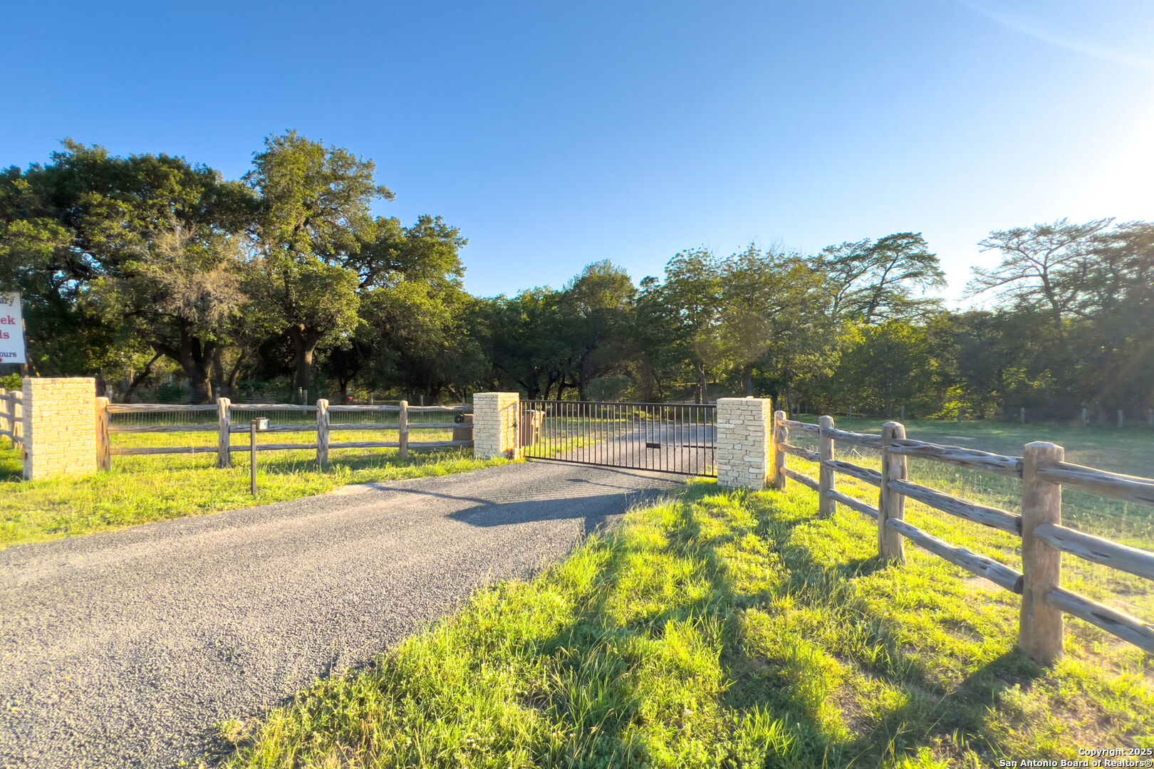 1146 Sisterdale Road Boerne, TX 78006 - Photo 4 of 94 a view of a swimming pool with an outdoor seating and yard