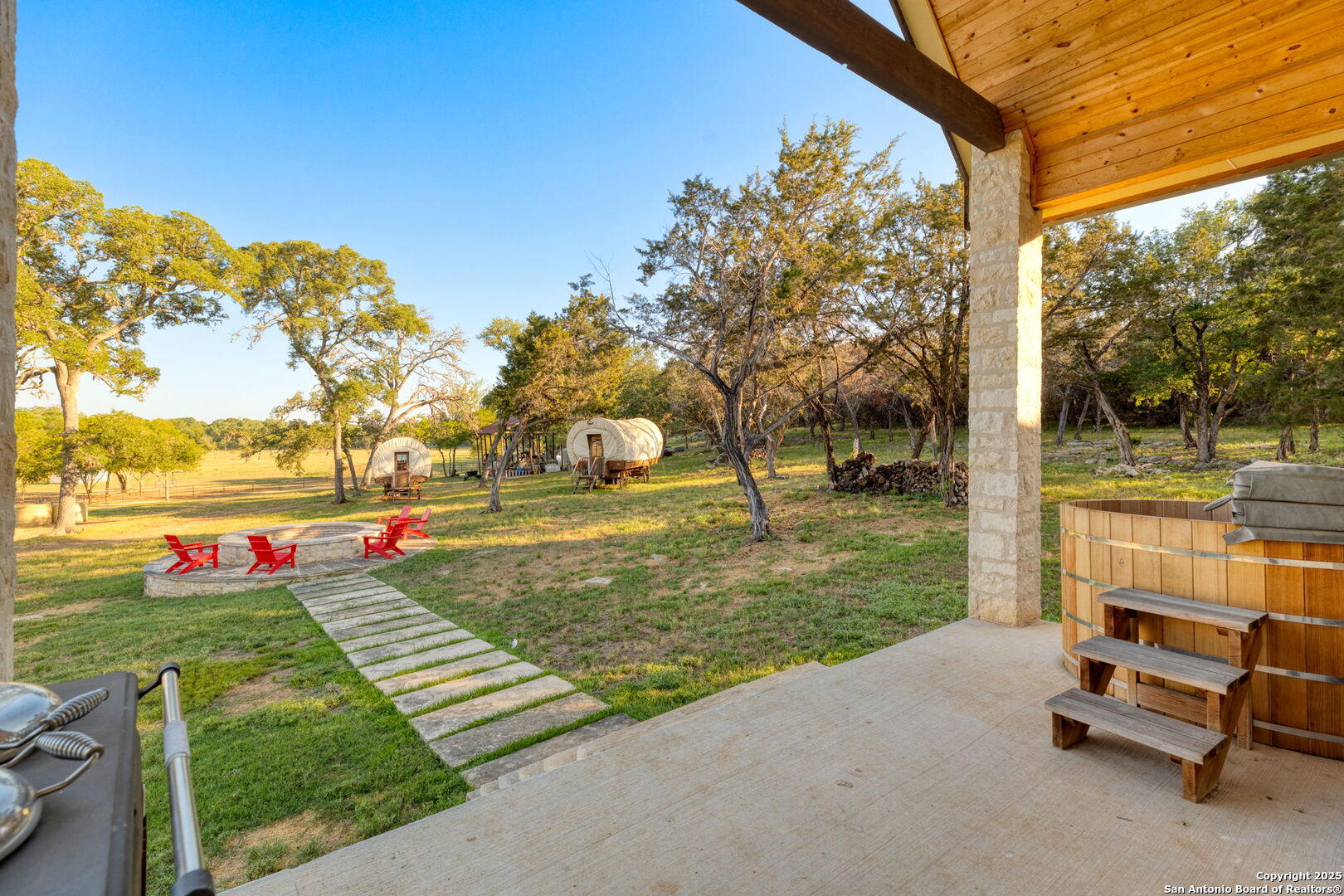 1146 Sisterdale Road Boerne, TX 78006 - Photo 42 of 94 a view of a garden with an outdoor space
