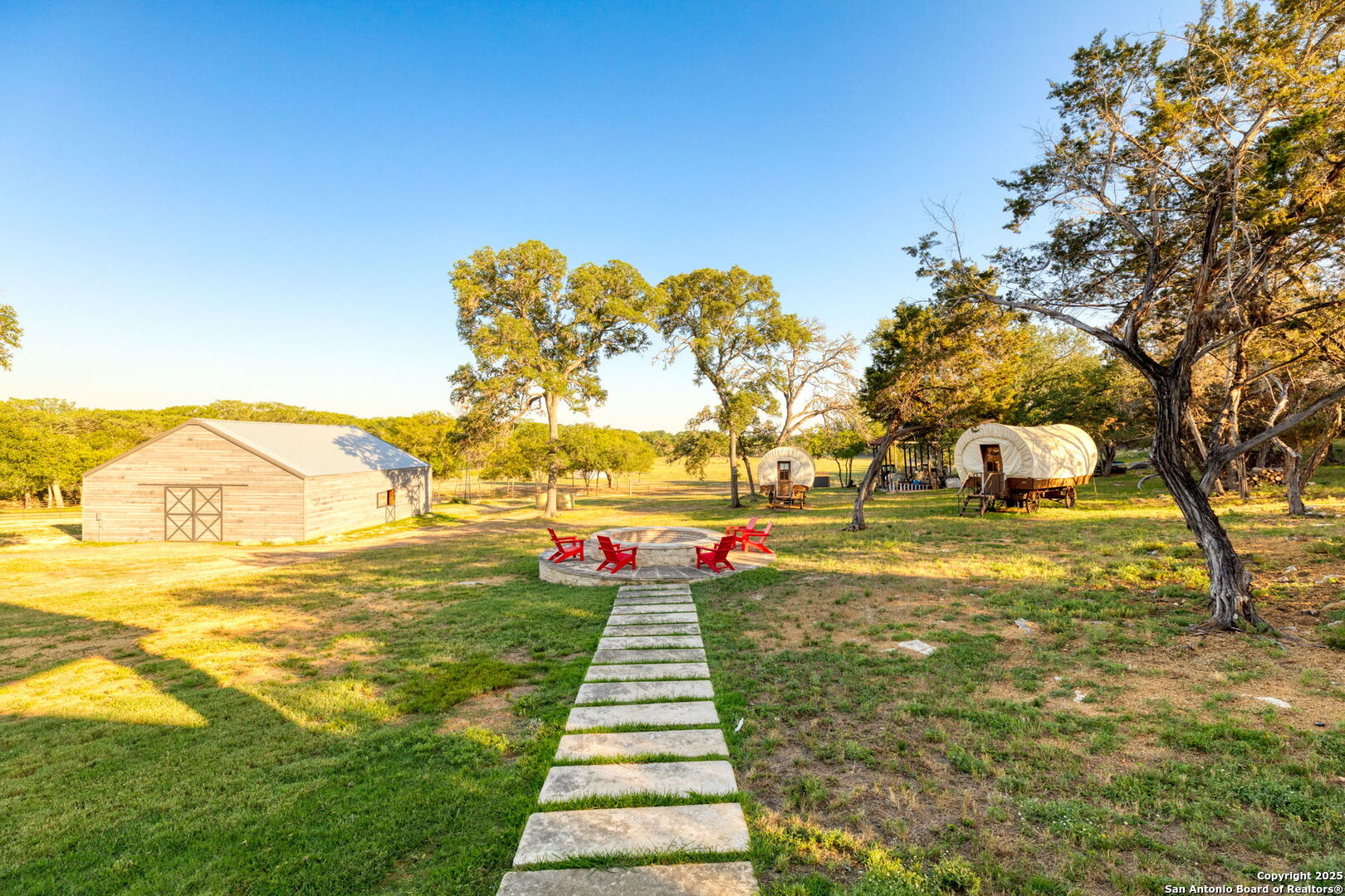 1146 Sisterdale Road Boerne, TX 78006 - Photo 43 of 94 a front view of a house with a yard