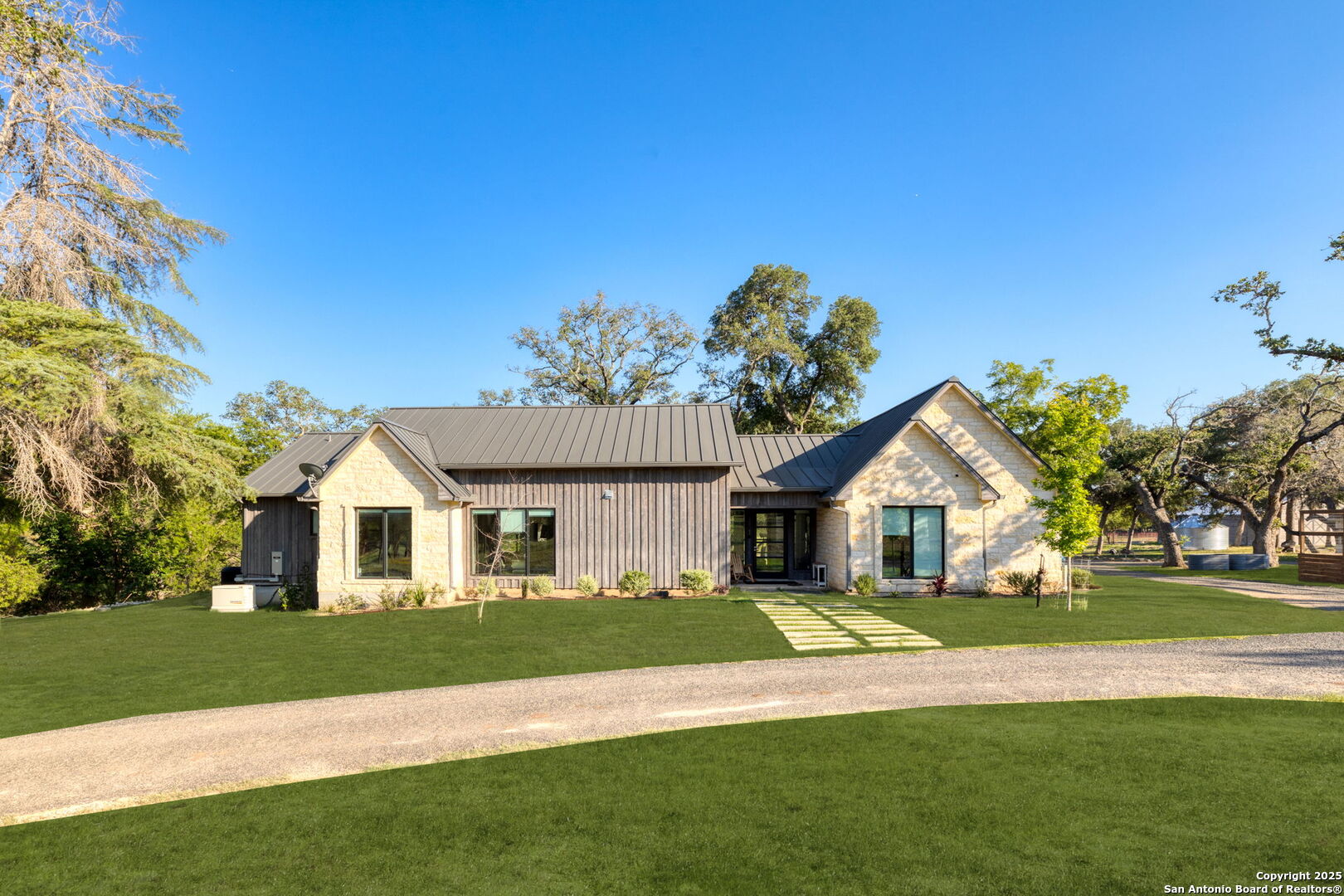 1146 Sisterdale Road Boerne, TX 78006 - Photo 6 of 94 a front view of a house with a yard