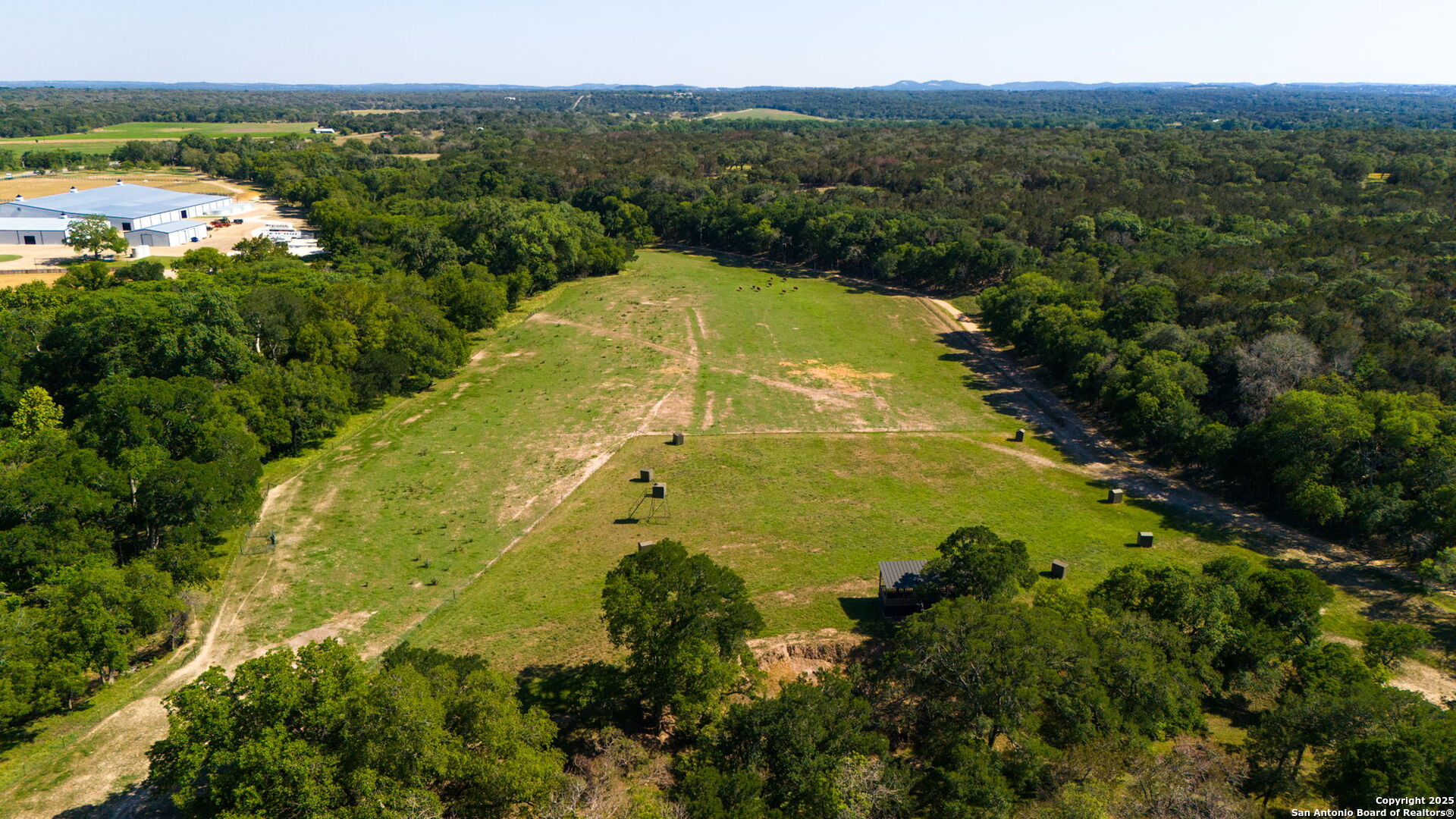 1146 Sisterdale Road Boerne, TX 78006 - Photo 81 of 94 a view of a lake with a city