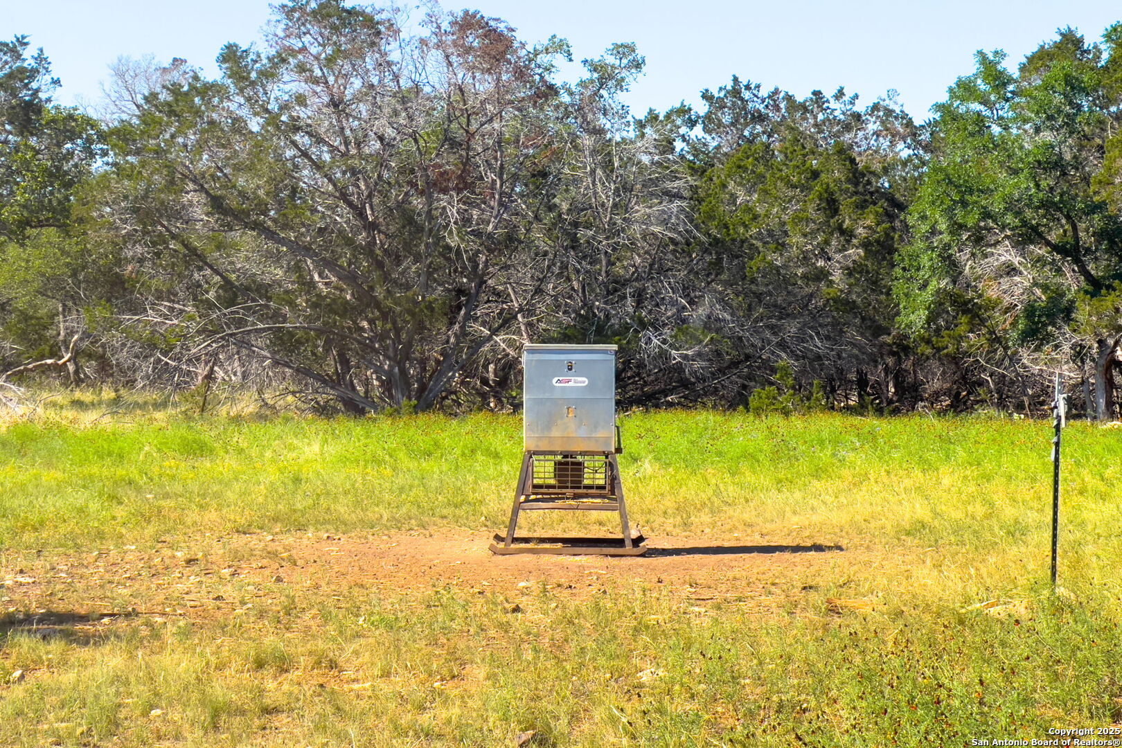 1146 Sisterdale Road Boerne, TX 78006 - Photo 93 of 94 a view of a swimming pool with an outdoor space and seating area