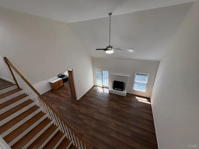 a kitchen with stainless steel appliances granite countertop a refrigerator a sink and dishwasher