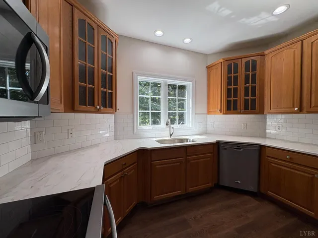 a view of cabinets with wooden floor