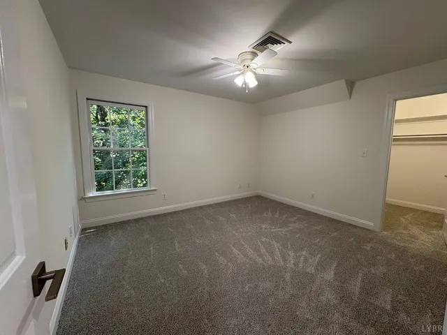 a view of deck with wooden floor and fence