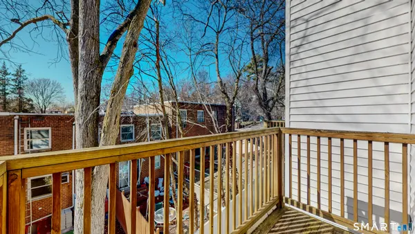 a view of a houses on the roof deck