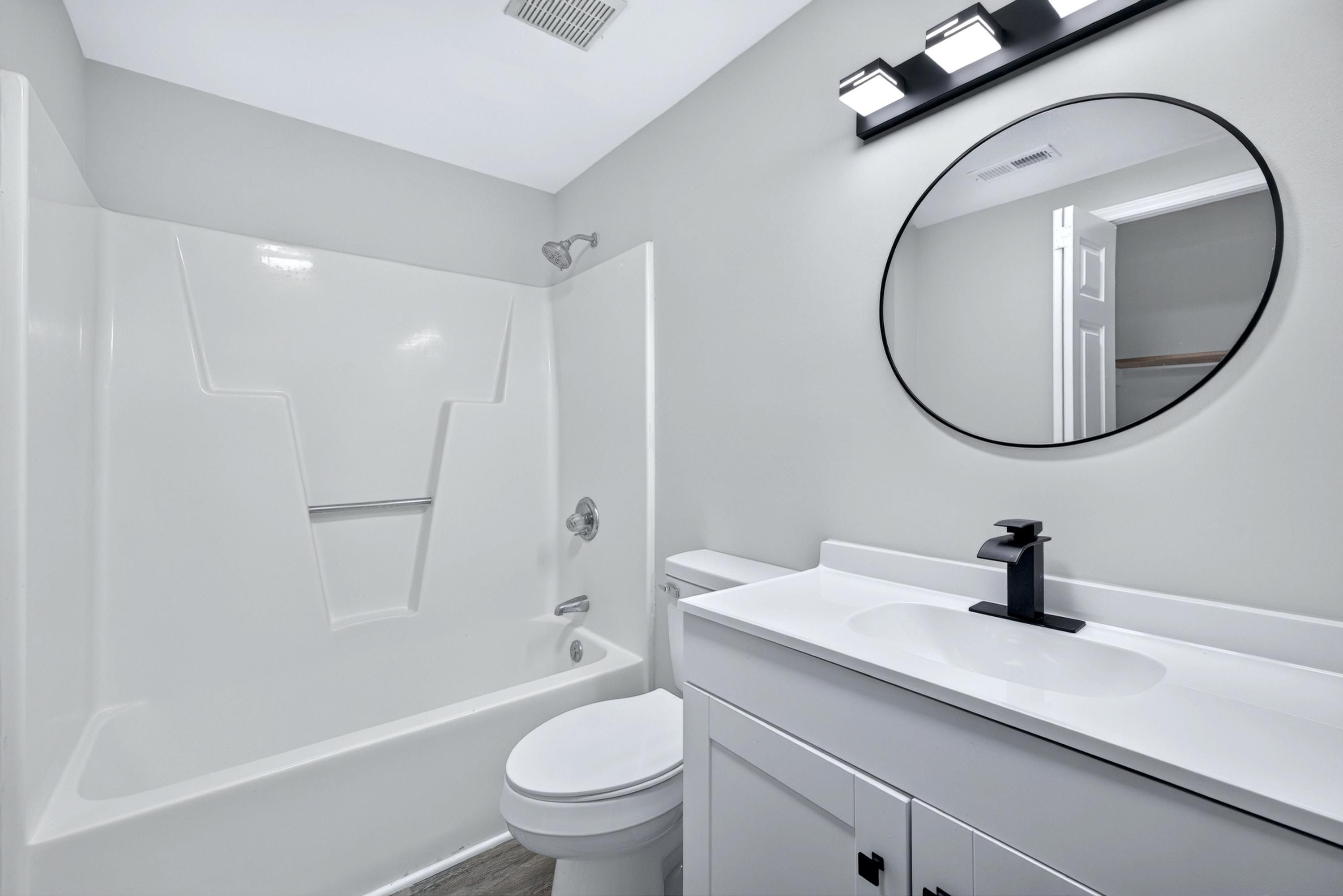708 Powell Drive, Unit A Raleigh, NC 27606 - Photo 25 of 56 Main level guest bath