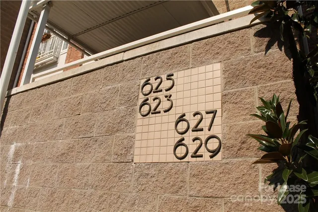 a sign that is on the side of a building