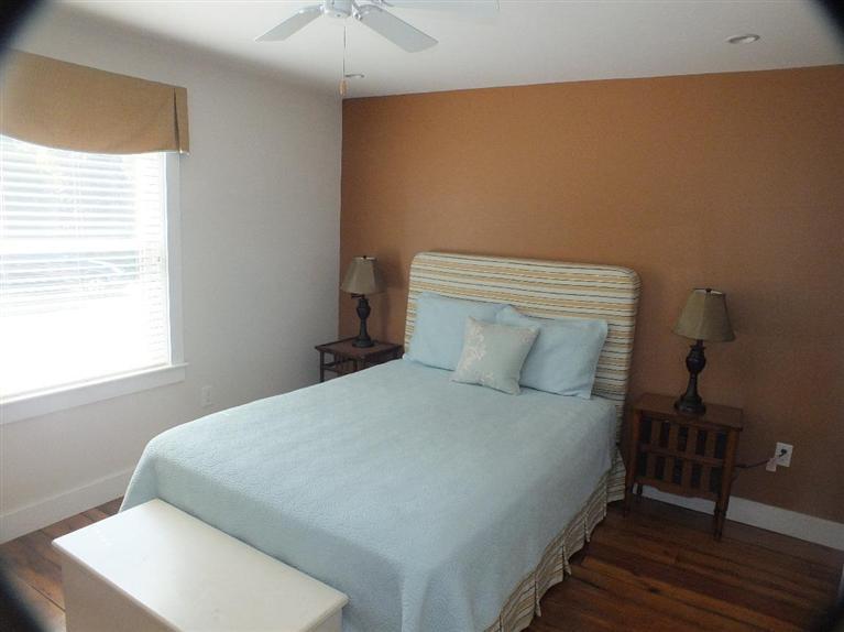 116 Castle Road Truro, MA 02666 - Photo 13 of 27 a bedroom with a bed and a night stand