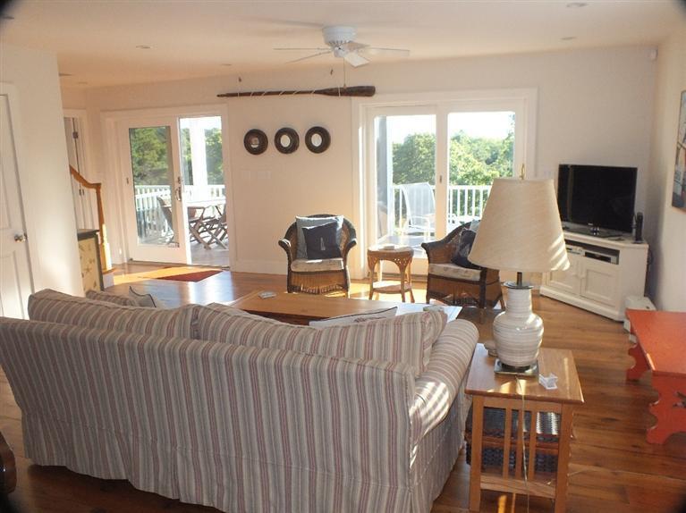 116 Castle Road Truro, MA 02666 - Photo 9 of 27 a living room with furniture and a flat screen tv