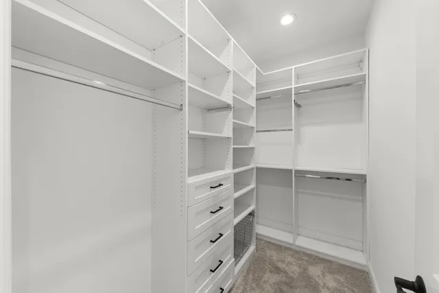 a view of an empty walk in closet