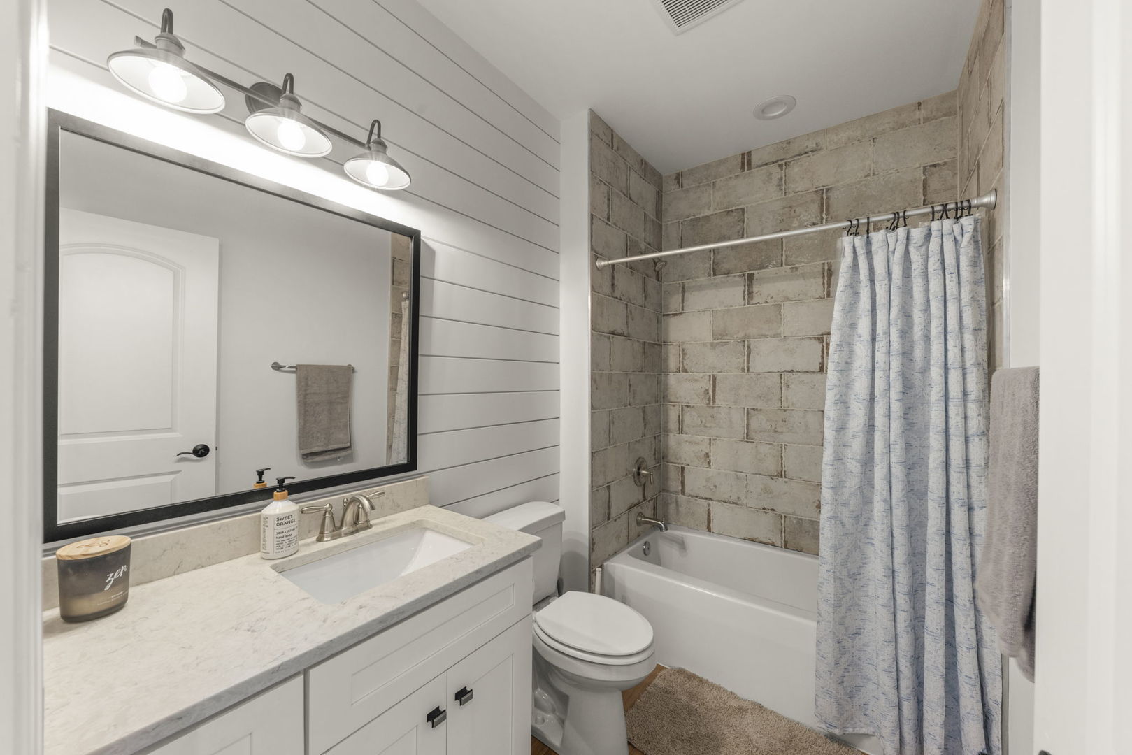 26411 West Stephanie Drive Channahon, IL 60410 - Photo 18 of 28 a bathroom with a bathtub shower sink mirror vanity and toilet