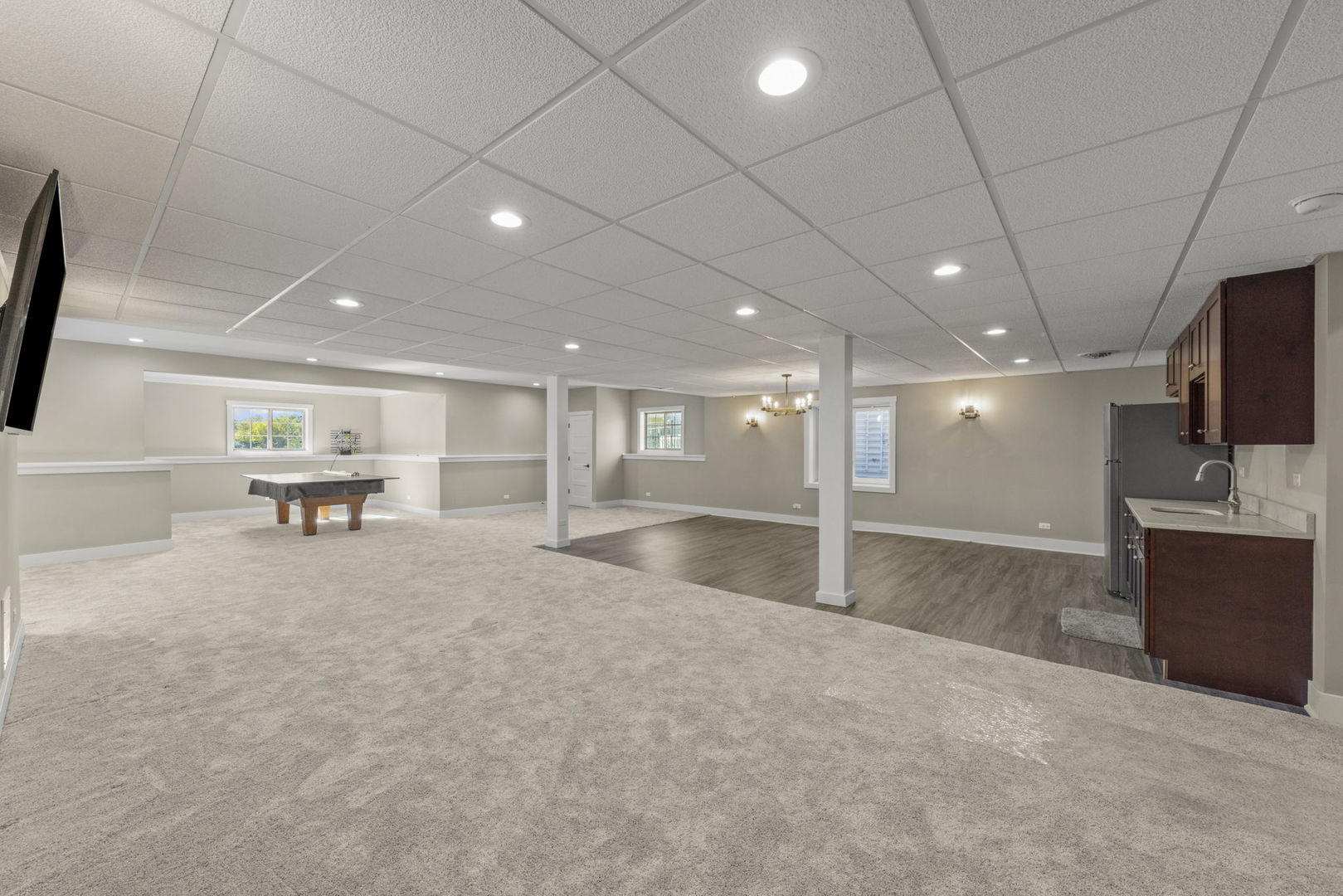 26411 West Stephanie Drive Channahon, IL 60410 - Photo 19 of 28 a view of a hall with kitchen and windows