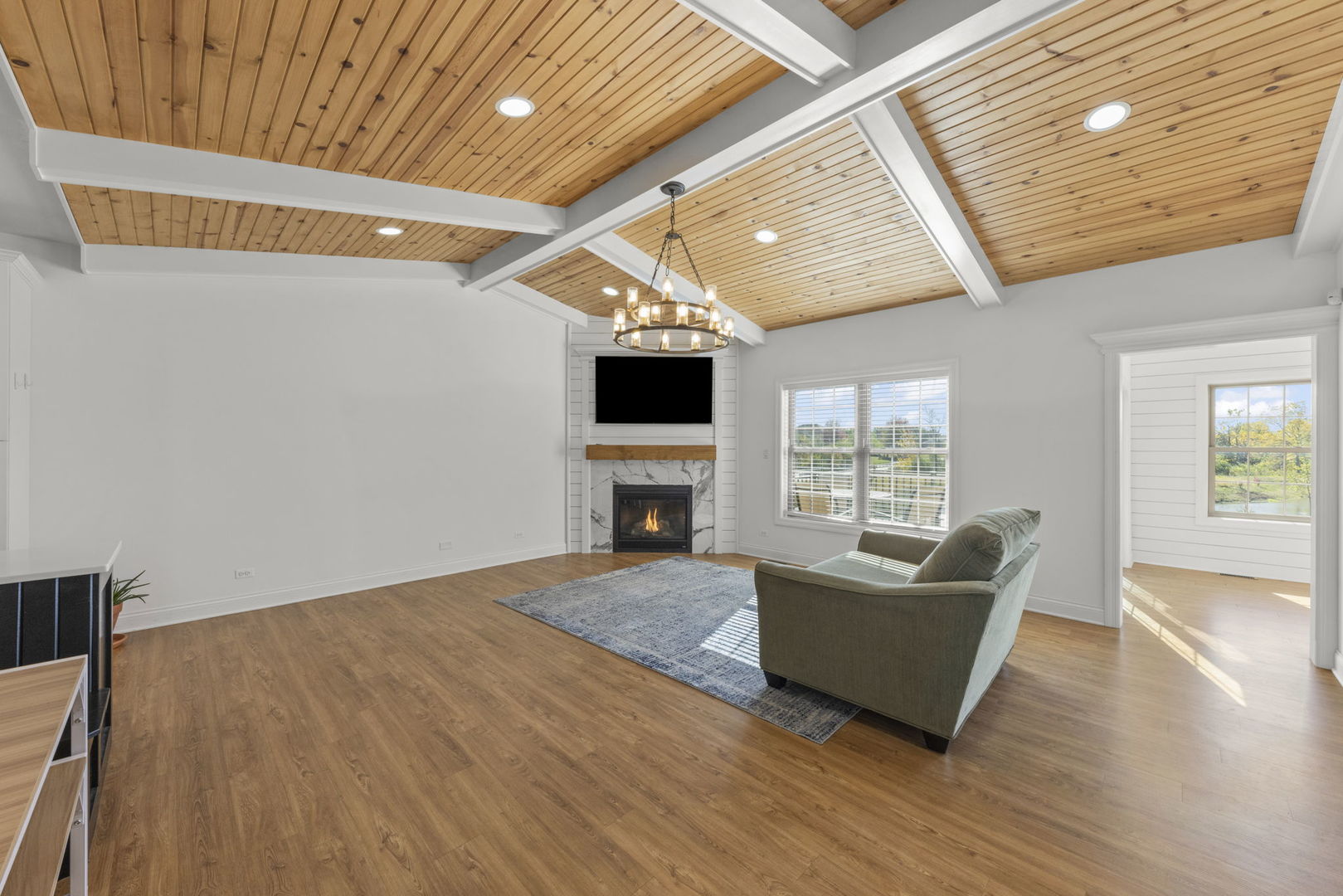 26411 West Stephanie Drive Channahon, IL 60410 - Photo 9 of 28 a living room with furniture and a flat screen tv