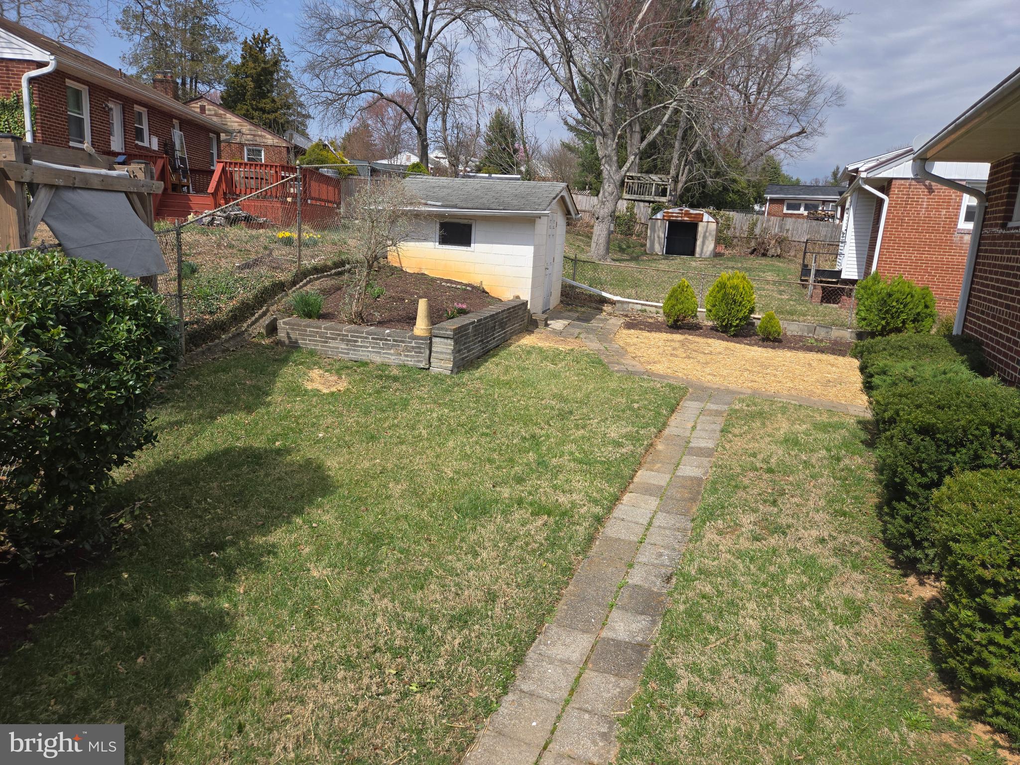 10500 Glenhaven Drive Silver Spring, MD 20902 - Photo 19 of 21 a front view of a house with garden