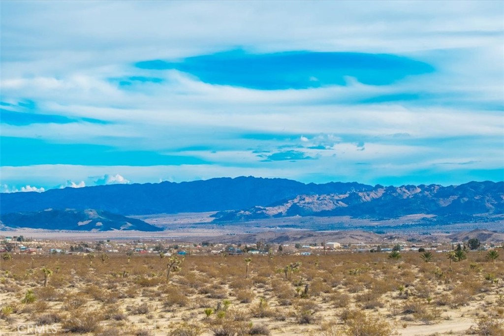 62155 Moonlight Mesa Street Joshua Tree, CA 92252 - Photo 13 of 29 a view of an ocean and a mountain