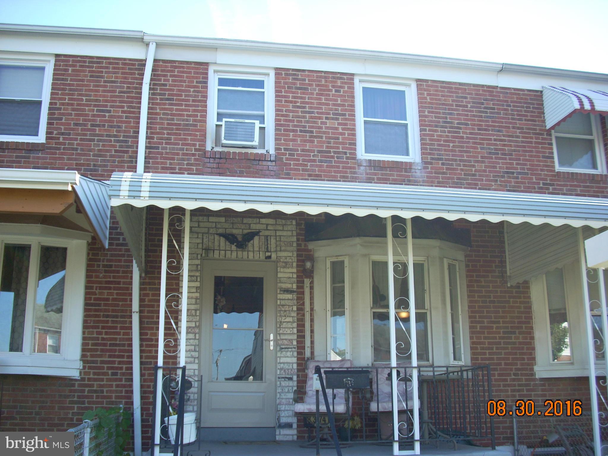 8374 Kavanagh Road Baltimore, MD 21222 - Photo 1 of 24 a view of brick building with large windows