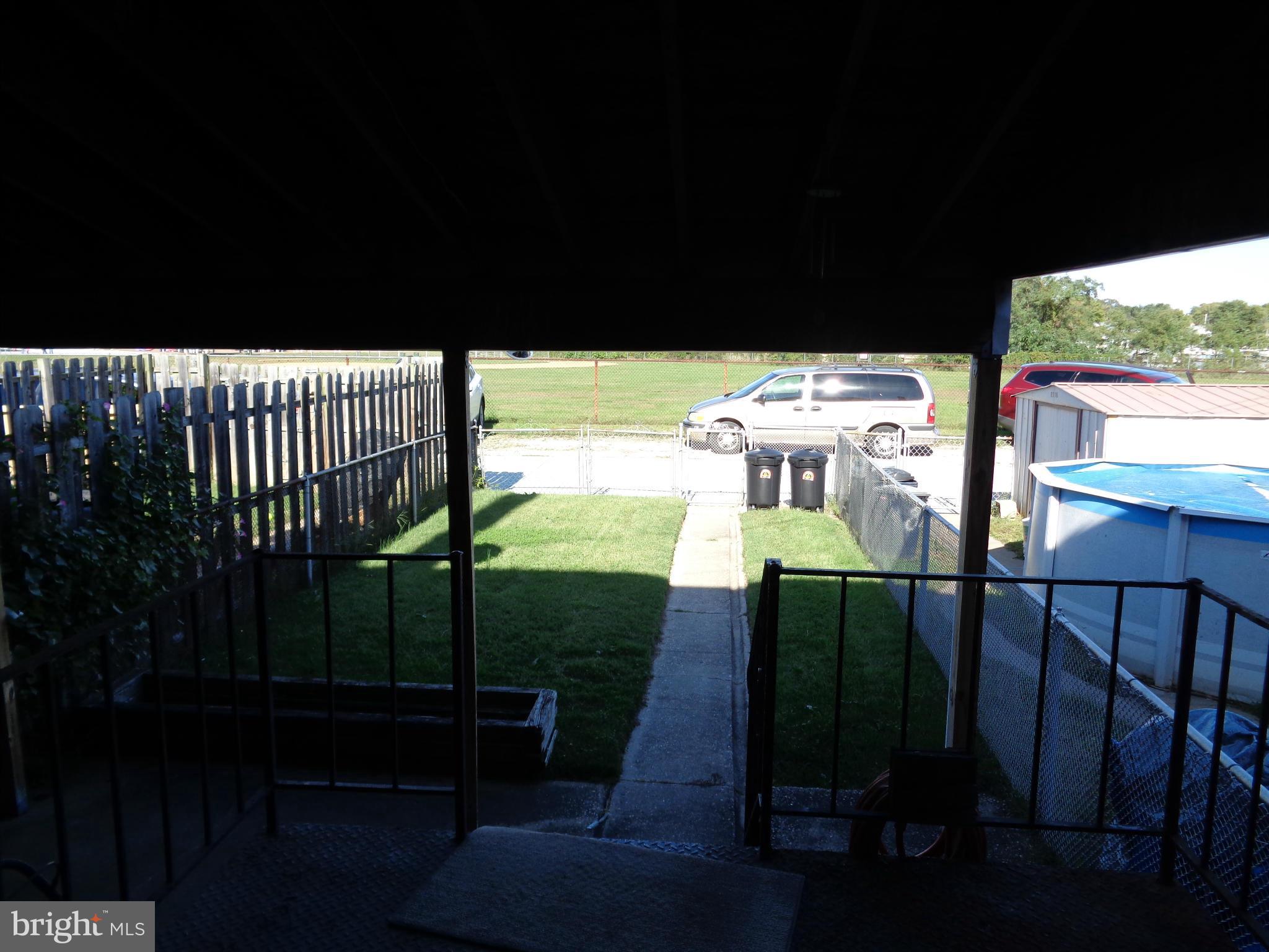 8374 Kavanagh Road Baltimore, MD 21222 - Photo 23 of 24 a view of balcony and patio