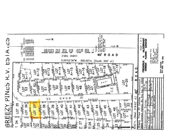 a sign that is on a brick wall