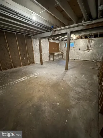 a view of room with wooden walls