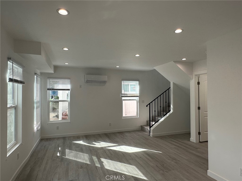 7012 Bertrand Avenue Reseda, CA 91335 - Photo 5 of 23 a view of entryway and hall with wooden floor