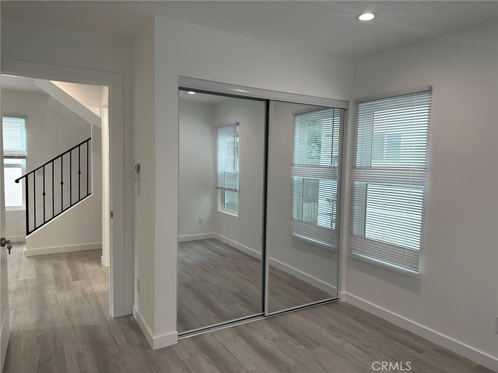 7012 Bertrand Avenue Reseda, CA 91335 - Photo 8 of 23 a view of entryway with wooden floor