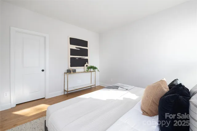 a bathroom with a sink a toilet a glass door a shower and a mirror