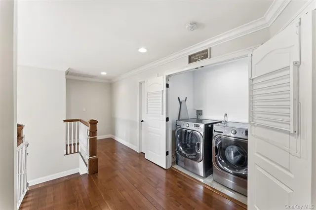 a view of a storage & utility room with washer and dryer