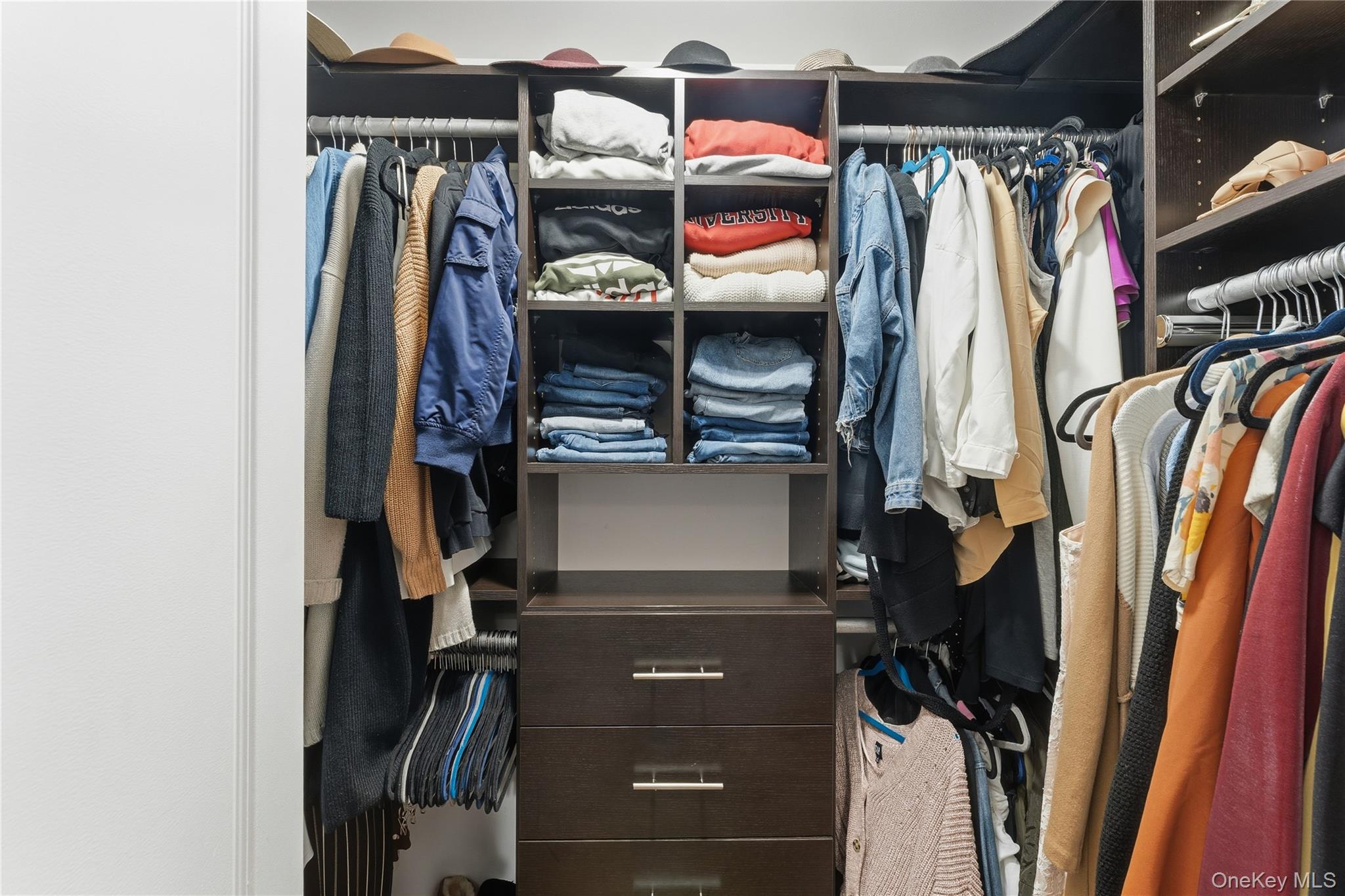 3483 Frederick Street Oceanside, NY 11572 - Photo 30 of 34 a view of walk in closet with clothes and shoes
