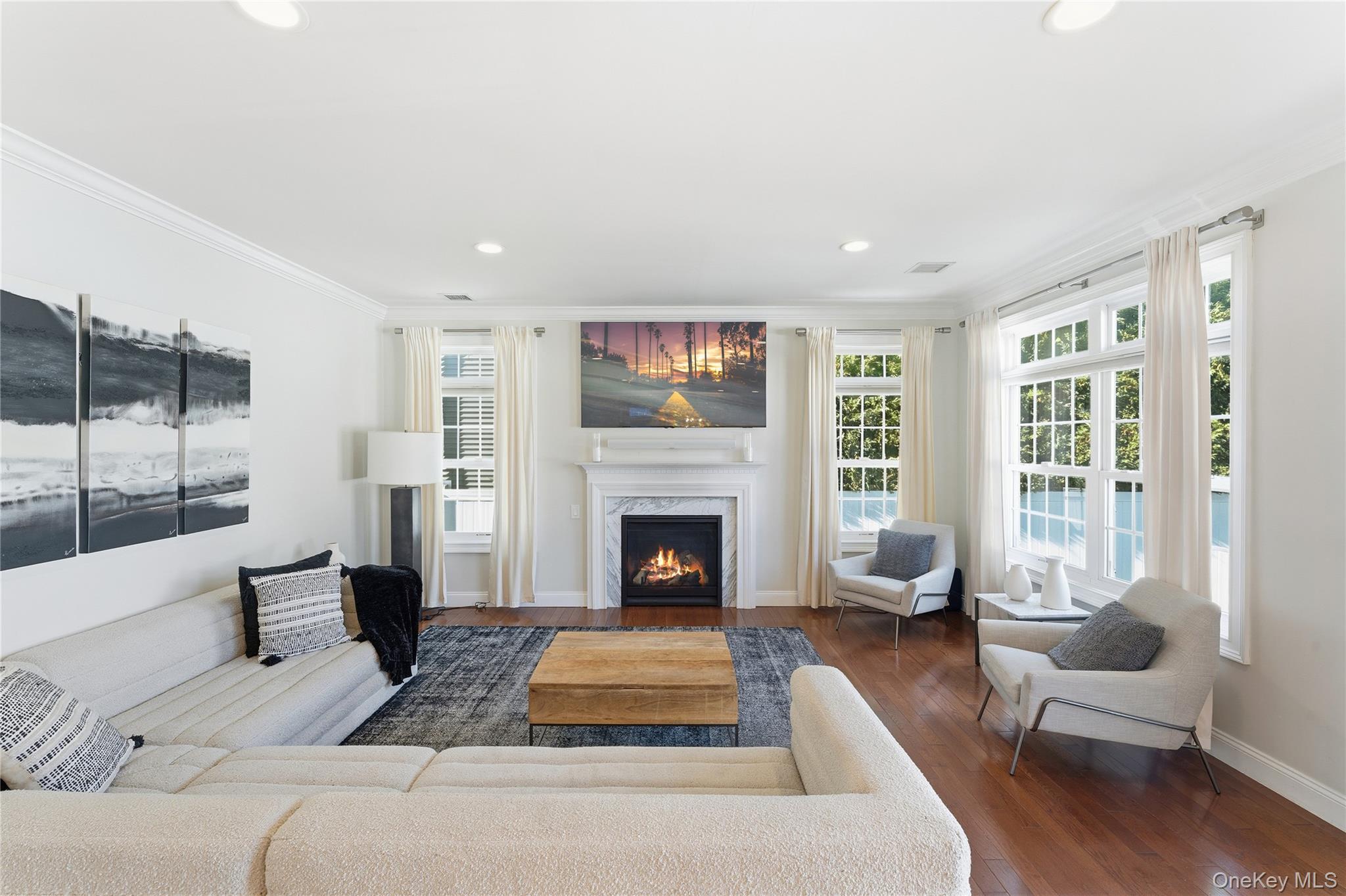 3483 Frederick Street Oceanside, NY 11572 - Photo 7 of 34 a living room with furniture fireplace and window