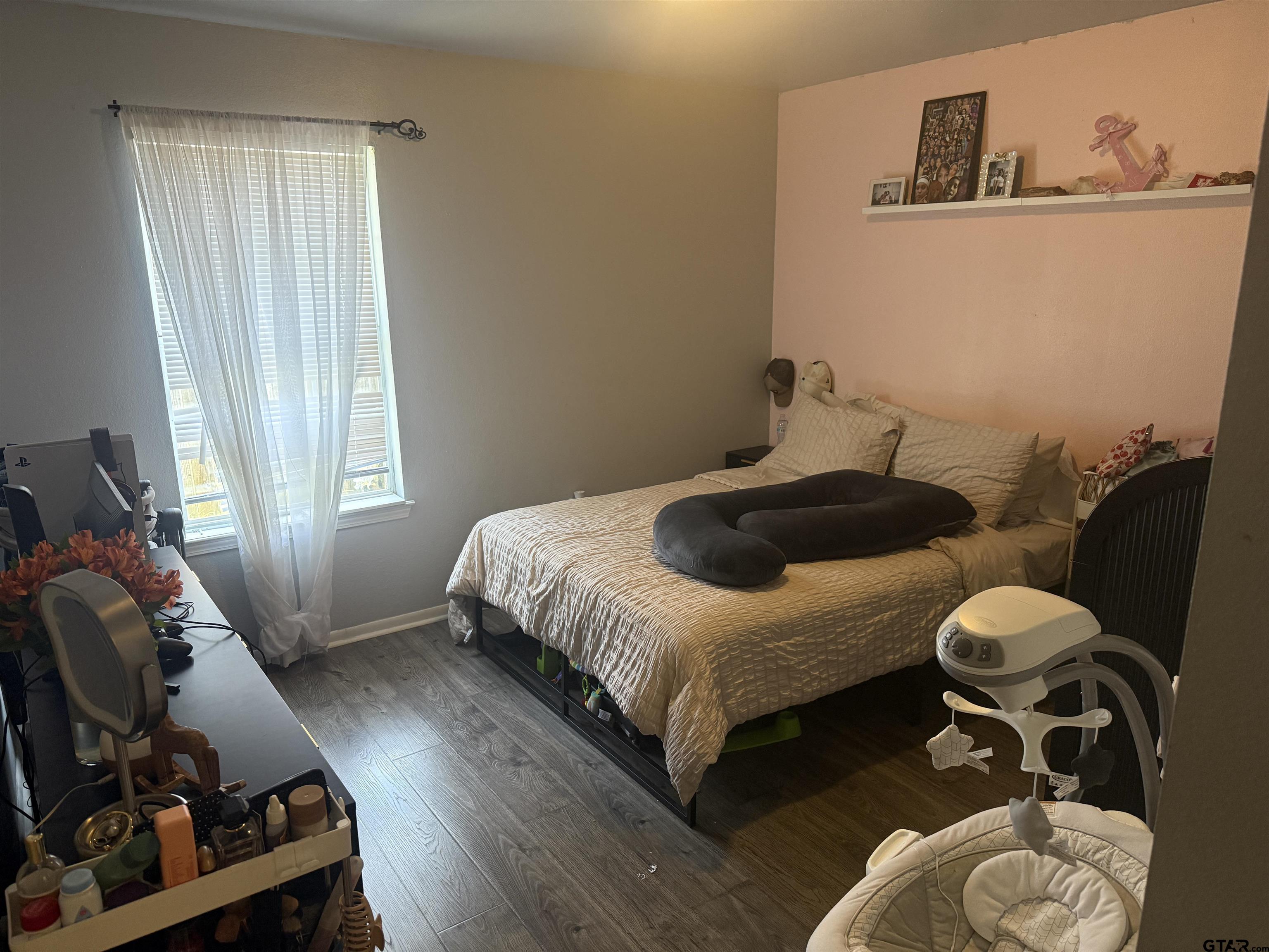 111 Jerome Court Rusk, TX 75785 - Photo 11 of 16 a bedroom with a bed and cabinets