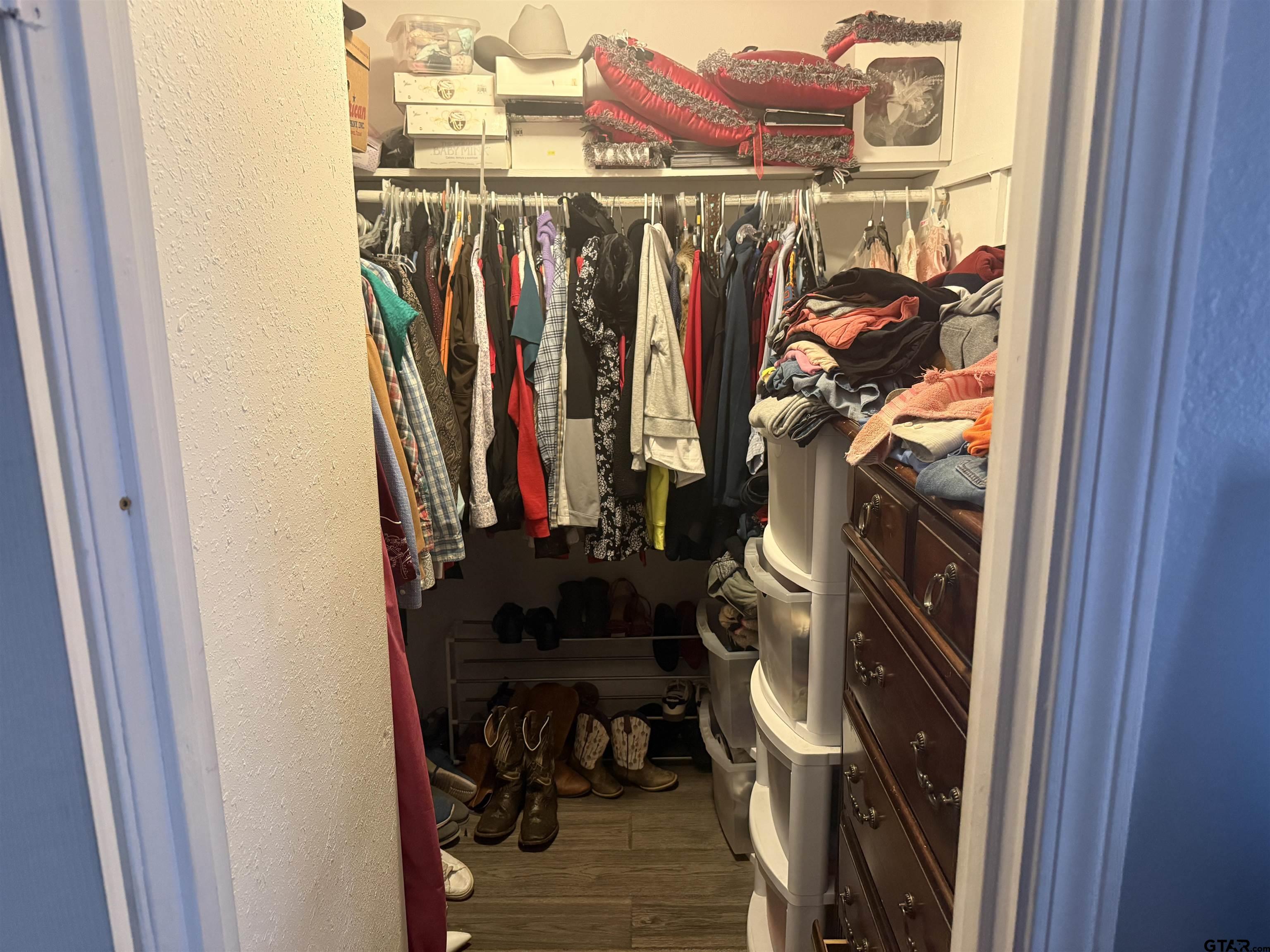 111 Jerome Court Rusk, TX 75785 - Photo 13 of 16 a view of walk in closet with clothes