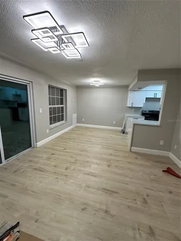 a view of a kitchen with a sink