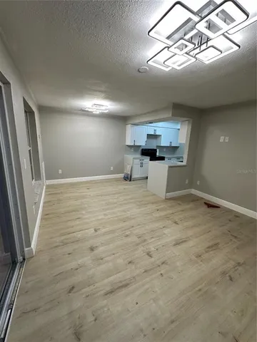 a kitchen with a sink a stove and refrigerator