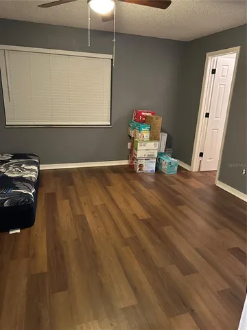 a view of livingroom with furniture and wooden floor