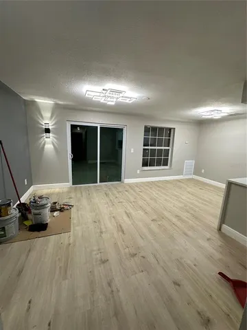 a view of a livingroom with a flat screen tv