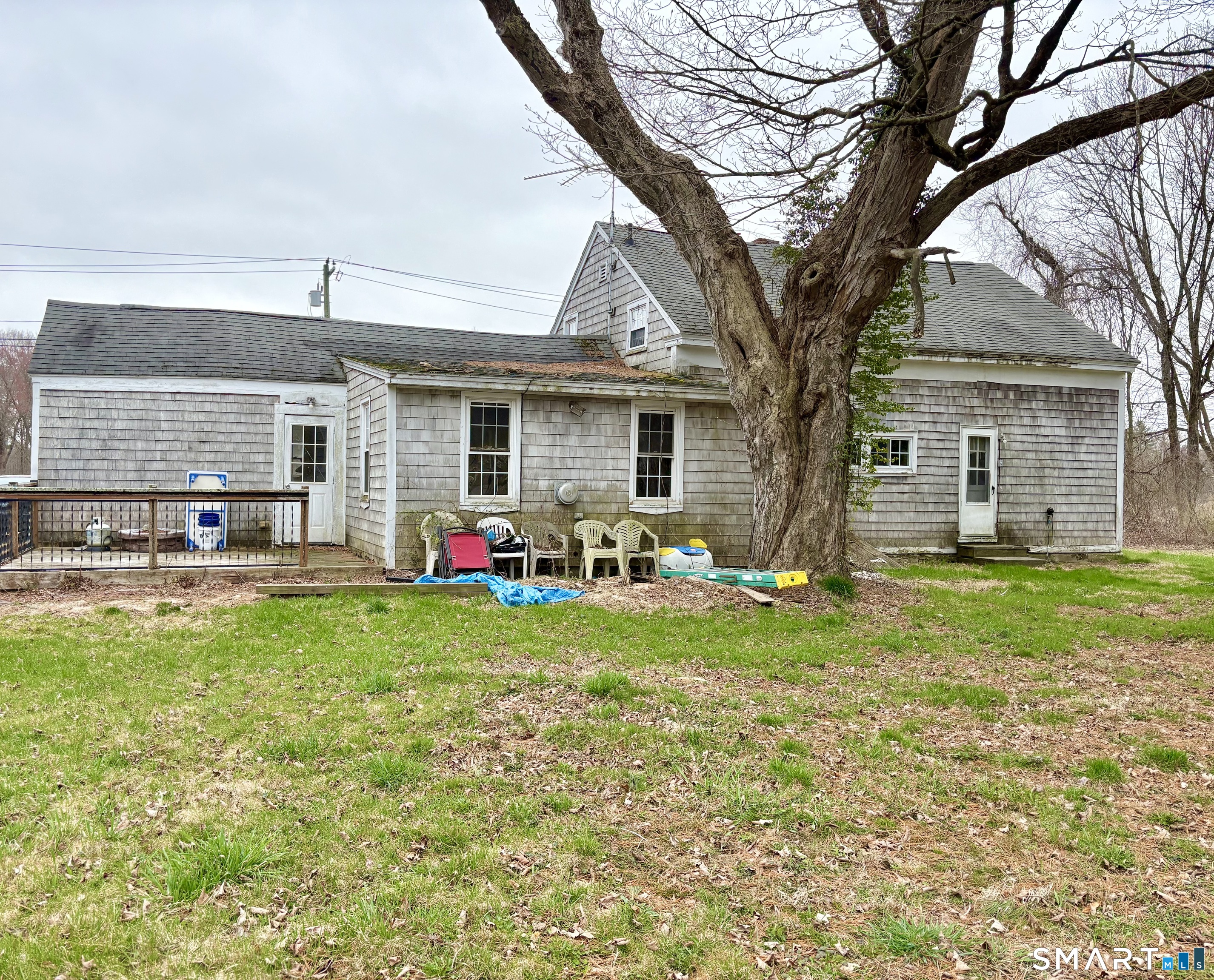 279 River Road Putnam, CT 06260 - Photo 4 of 18 a front view of house with yard and green space