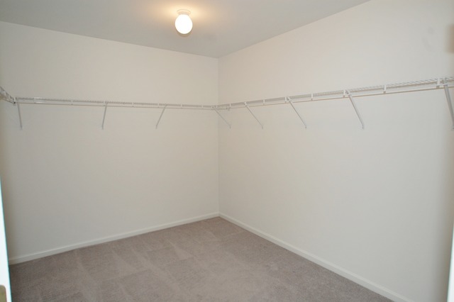 2103 Ivy Ridge Drive Hoffman Estates, IL 60192 - Photo 11 of 24 a view of a room with racks on the wall