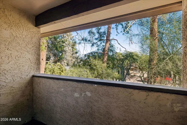 a view of entryway with wooden walls