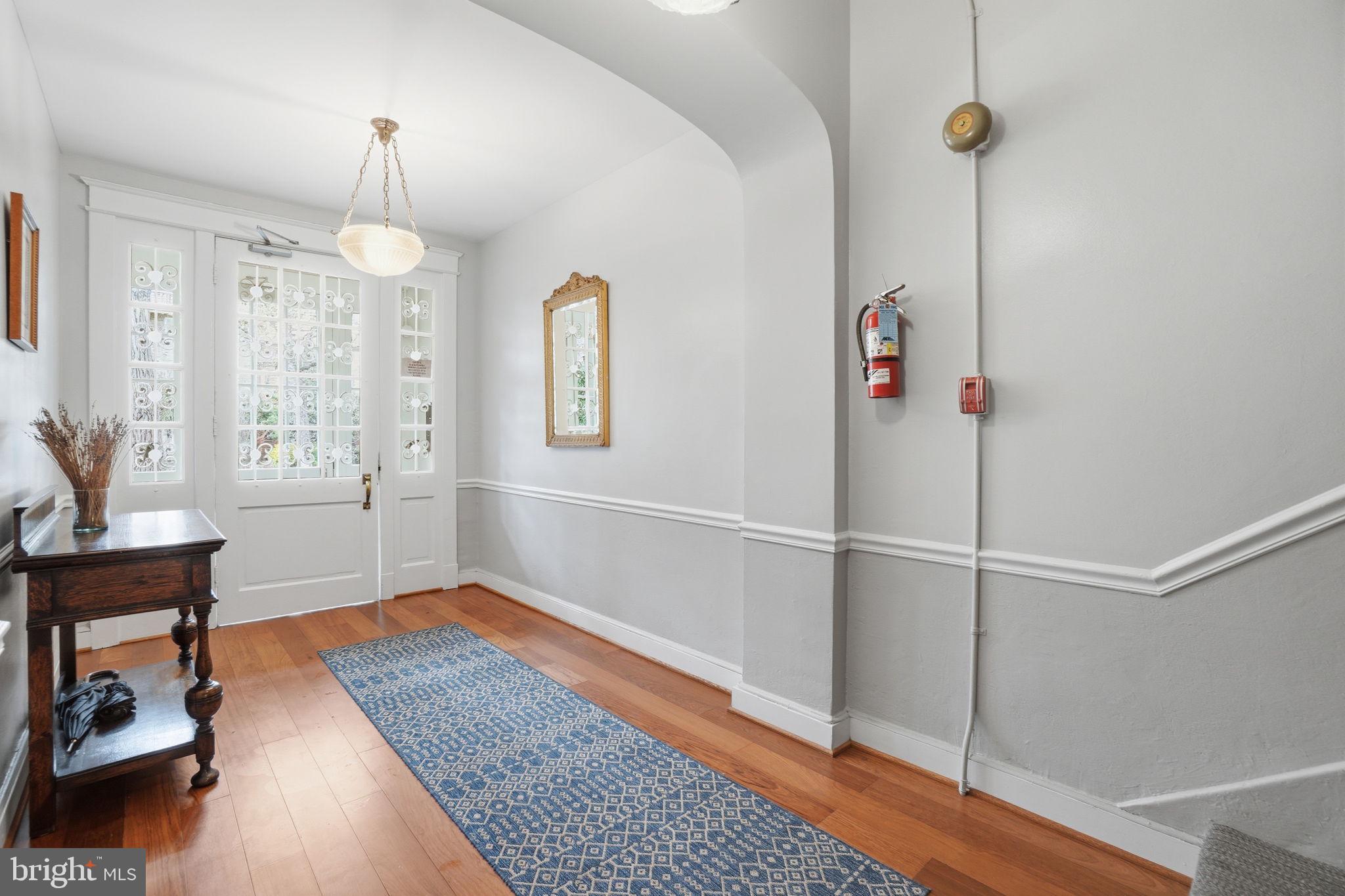 1835 16th Street Northwest, Unit 1 Washington, DC 20009 - Photo 20 of 27 a view of livingroom with furniture and wooden floor