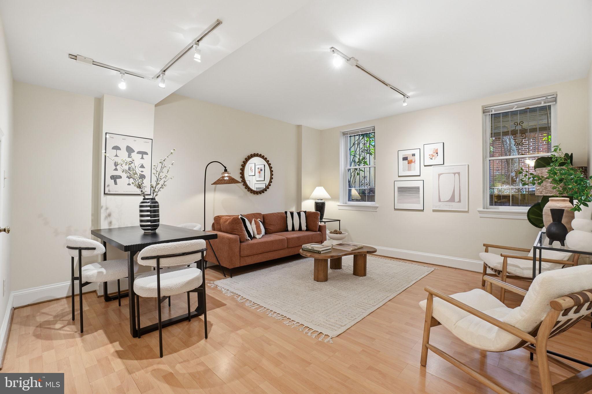 1835 16th Street Northwest, Unit 1 Washington, DC 20009 - Photo 2 of 27 a living room with furniture and wooden floor