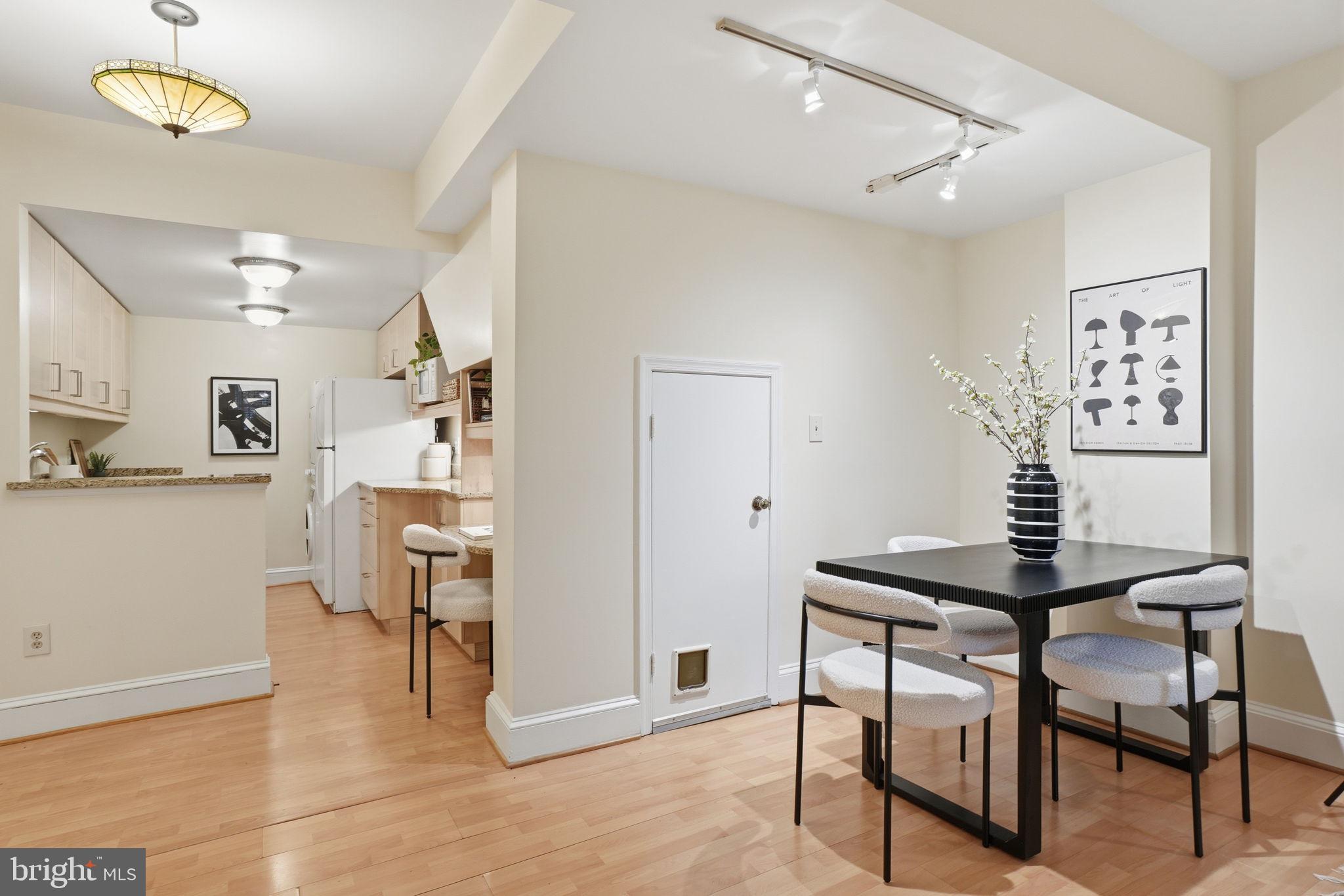 1835 16th Street Northwest, Unit 1 Washington, DC 20009 - Photo 6 of 27 a view of a livingroom with furniture and a workspace