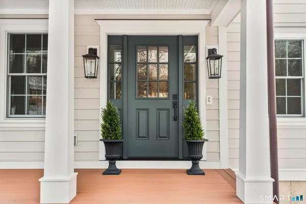 a view of entrance of house and front door