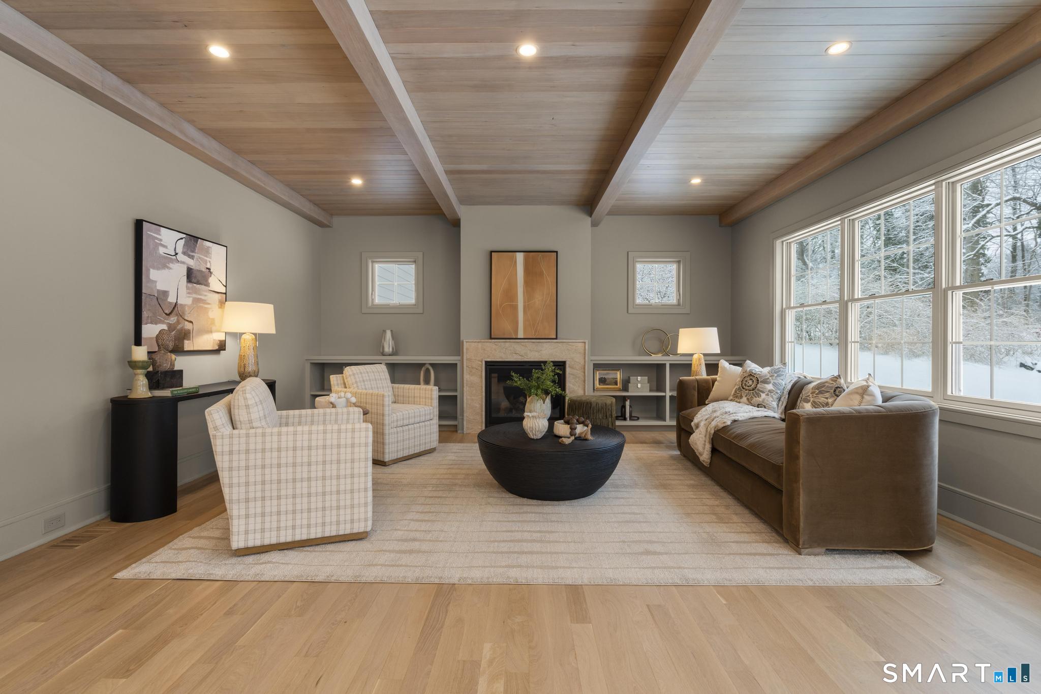 204 Glen Ridge Road Fairfield, CT 06825 - Photo 14 of 45 a living room with furniture and a large window