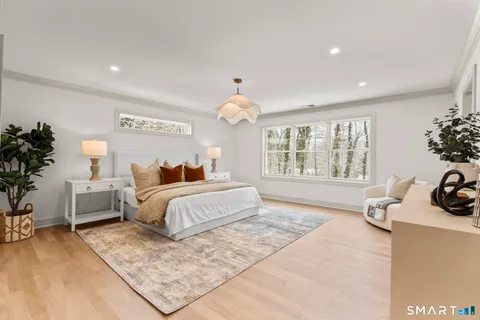 a bed room with a bed and a couch