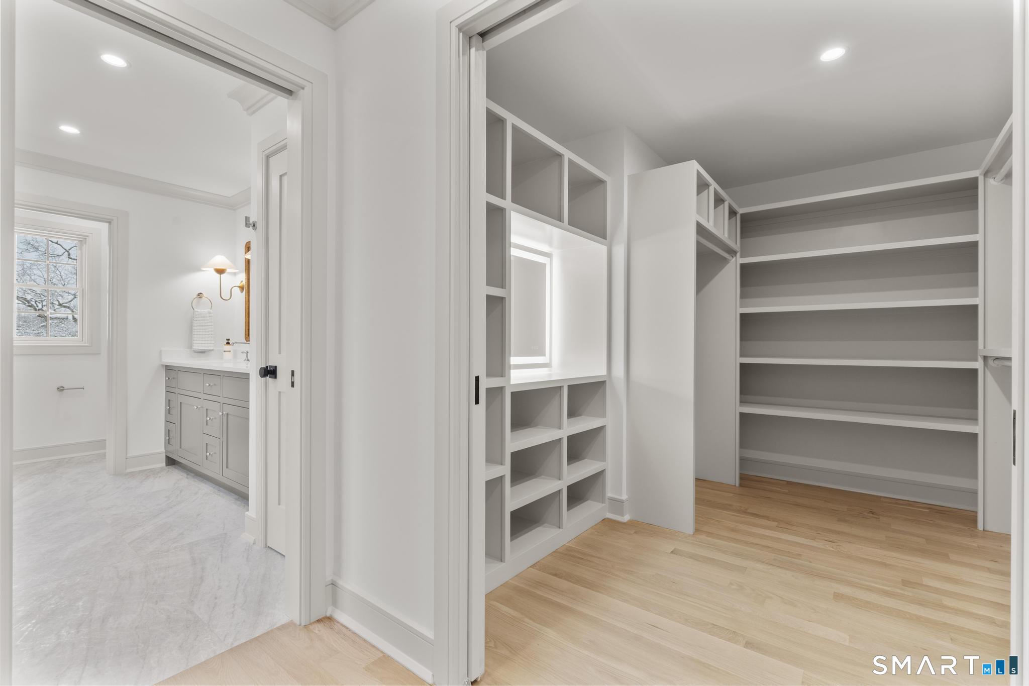 204 Glen Ridge Road Fairfield, CT 06825 - Photo 35 of 45 a view of walk in closet with empty racks