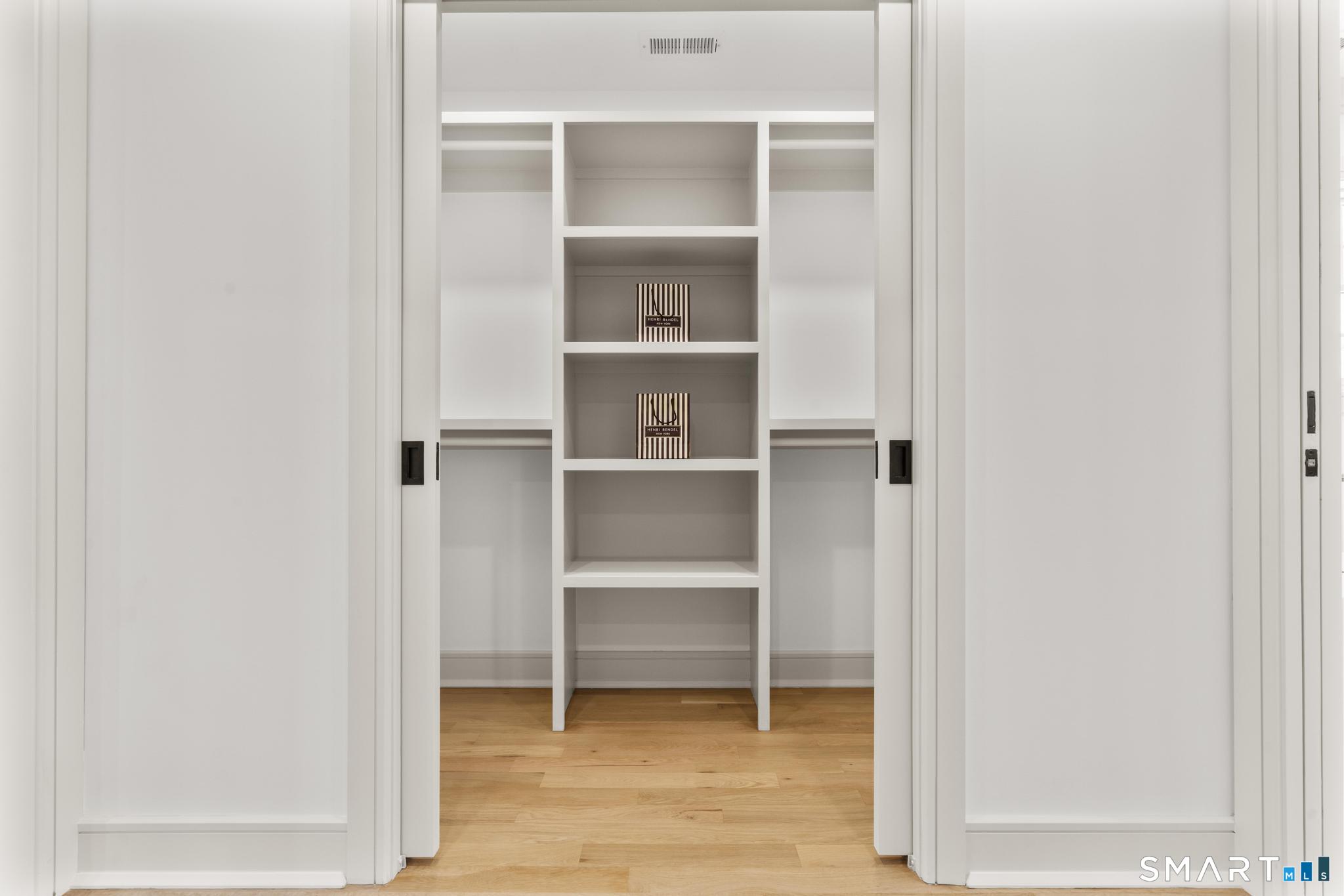 204 Glen Ridge Road Fairfield, CT 06825 - Photo 36 of 45 a view of an empty walk in closet