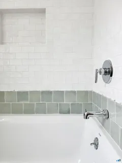 a bathroom with a bathtub